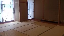 和室（桜）。畳敷きの室内と障子が見える。